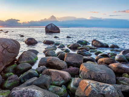 Sunset on the Baltic Sea, boulders on the shore, Schwanensteint in the back, Lohme, Jasmund