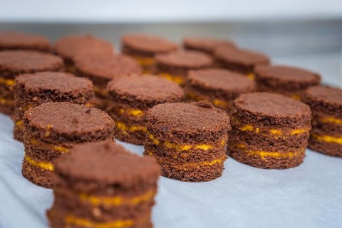 Chocolate chip cookies with filling on a tray, vegan cake production, Haselstaller Hof, Gechingen,