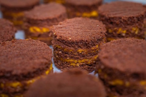 Close-up of small chocolate cakes with yellow layers, vegan cake production, Haselstaller Hof,