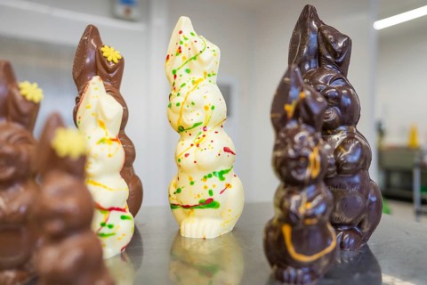 Different sized chocolate bunnies in Easter presentation, Easter production of regional products,