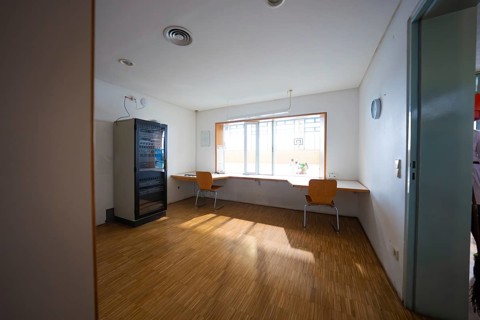 Simple break room with vending machine, chairs and large window, Schlehengäu sports hall Gechingen,