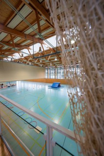 Interior view of a gym with net, playing field and impressive light, Schlehengäu Sporthalle