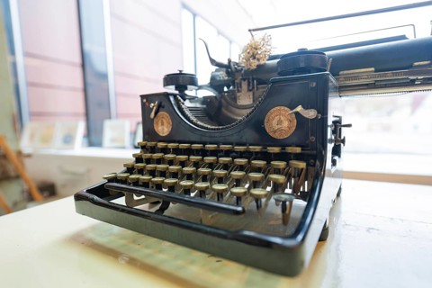 Antique typewriter in front of a window, nostalgic atmosphere, Gechingen Town Hall, Calw district,