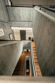 Modern architecture with concrete and wooden tiles from a stairway view, Gechingen Town Hall, Calw
