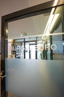 Glass door of the Bürgerbüro, modern design with bright office atmosphere, reception area,