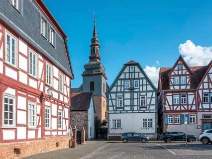 Half-timbered houses on the market square in the historic old town of Büdingen, Hesse, Germany