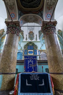 Central Bima, a parish in the back, curtain in front of the Torah shrine, synagogue in Lancut