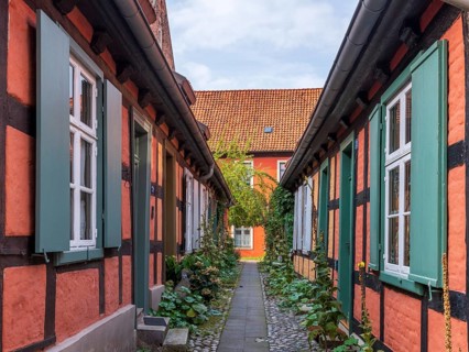 Narrow alley with half-timbered houses in the Heilgeisthospital, also Heilgeistkloster or Kloster