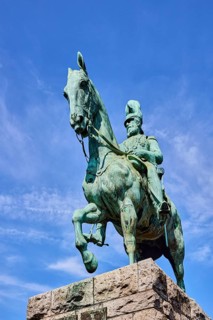 Emperor Frederick III, equestrian statue, sandstone pedestal, blue sky, cirrus clouds, Hohenzollern