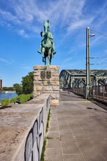 Equestrian statue of Emperor Frederick III, sandstone wall, Hohenzollern bridge, arched bridge,