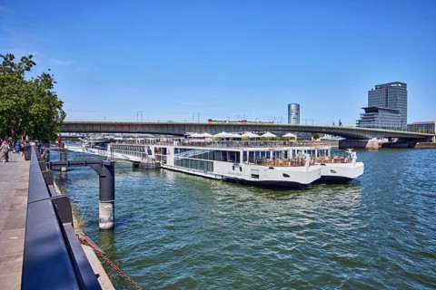 Rhine river, Viking Hlin river cruise ship, Viking Cruises, MaxCologne high-rise building, car