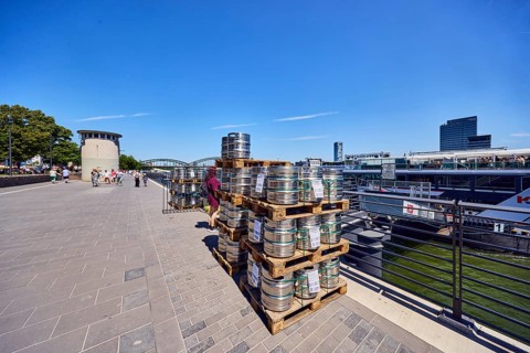 Pallets with beer barrels, boat launch, gangway, Rhine river, waterfront, level, metal railings,