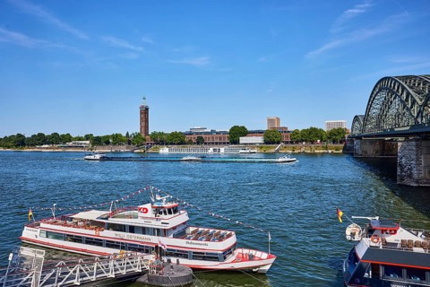 Rhine river, Hohenzollernbrücke pedestrian and railway bridge, excursion ship Willi Ostermann,