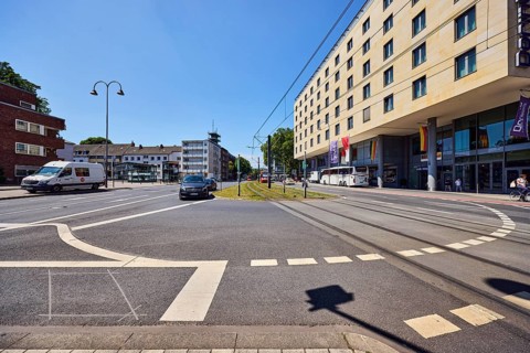 Dorint hotels, general development, commercial buildings, modern architecture, overhead lines, tram