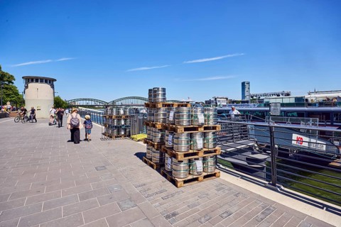 Pallets with beer barrels, boat launch, gangway, Rhine river, waterfront, level, metal railings,