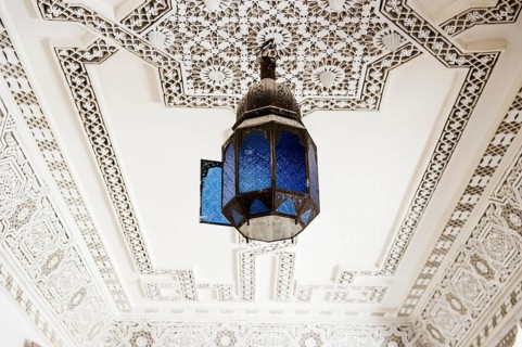Lamp and stucco ceiling, Souk, Marrakech, Morocco
