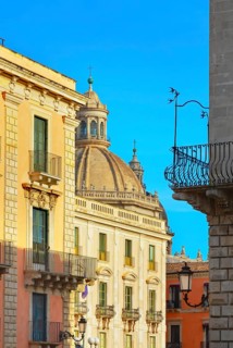 Historic centre view including the dome of Badia di Sant'Agata church, Catania, Sicily, Italy