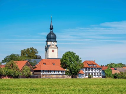 The village of Apfelstädt with the church of St. Walpurgis and half-timbered houses, Thuringia,