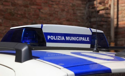 Polizia municipale, police car in Italy, marking on the roof of the car, lettering. Polizia