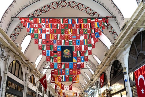 Istanbul, Turkey. June 23rd 2025. A display of flags of the world surrounding an Ottoman flag