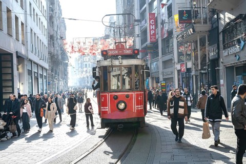 Istanbul, Turkey. December 2nd 2025. A traditional Turkish tram along street, busy with shoppers