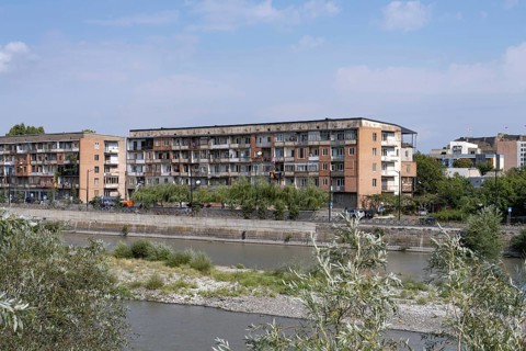 Gori, Georgia. September 9th 2025. Soviet style housing buildings beside the Kura Rive in Gori, a