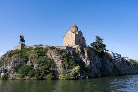 Tbilisi, Georgia. July 13th 2025. Metekhi Church of the Nativity and the Virgin Mary overlooking