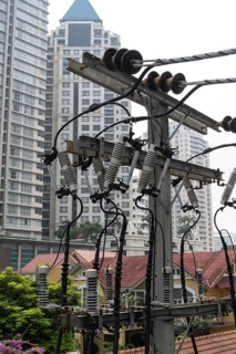 Bangkok, Thailand. March 4th 2025. Electricity power distribution lines connecting electric
