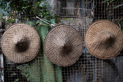 Traditional hats being used a street decoration in the Talat Noi neighbourhood of Bangkok,