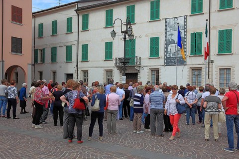 Group of visitors in the town of Don Camillo and Peppone, Brescello, Emilia-Romagna, Italy