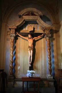 Brescello village, cross, cross with the talking Jesus from the movie Don Camillo and Peppone, in