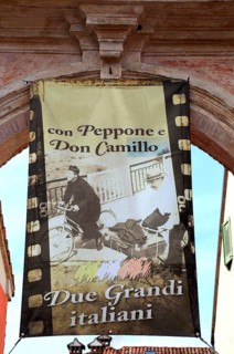 Italy, village of Brescello, advertisement for Museum of Don Camillo and Peppone, Emilia-Romagna