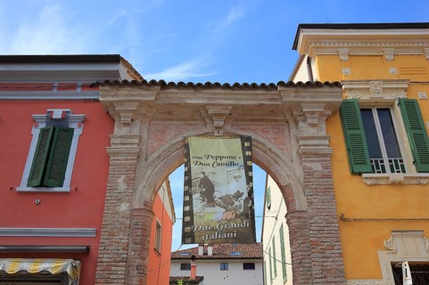 Italy, village of Brescello, advertisement for Museum of Don Camillo and Peppone, Emilia-Romagna