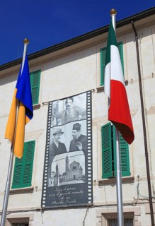 Italy, Brescello village, the town hall, Don Camillo and Peppone, flags, Italian