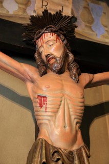 Italy, village of Brescello, cross from the movie, Don Camillo and Peppone in the church of