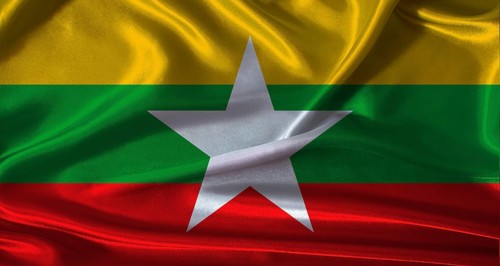 National flag of Myanmar with cloth texture. Myanmar flag with realistic texture background
