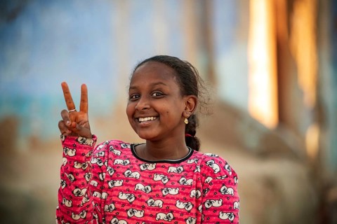 Aswan, Egypt. December 10th 2022 Pretty happy smiling young Nubian girl in the Nile side Nubian