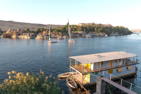 Aswan, Egypt. December 9th 2022 Beautiful scenic view of an Egyptian house boat on the River Nile