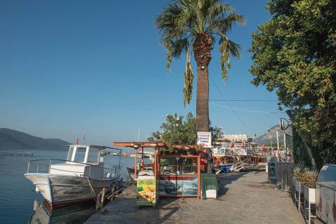 Akyaka, Mugla, Turkey. September 8th 2022 A boat moored in the beautiful harbour of Turkish Riviera