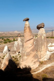 Beautiful morning light on the fairy chimney rock formations known as the Three Graces, part of the