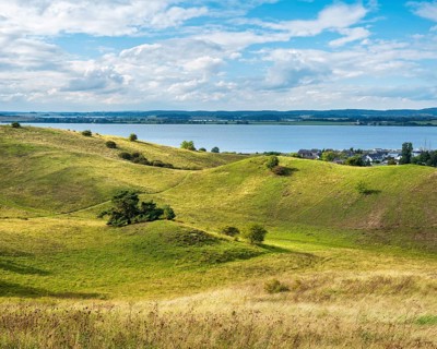 Hilly landscape in the Zicker Mountains, including Zicker Alps, view over the lagoon landscape, on
