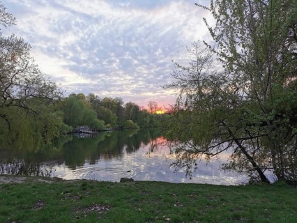 Sunset at Weissensee in Berlin with reflecting water, Pankow, Berlin