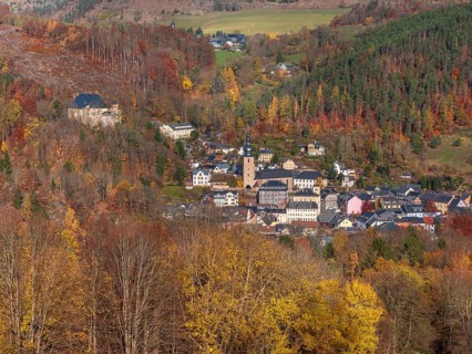 View of Gräfenthal with Wespenstein Castle in the Thuringian Highlands in autumn, Gräfenthal,