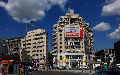 Romania, capital Bucharest, Bucuresti, office buildings and residential buildings with advertising