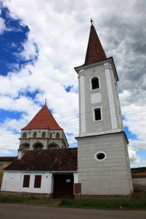 Romania, church tower of the fortified church in the village of Klosdorf, Romanian Cloasterf,