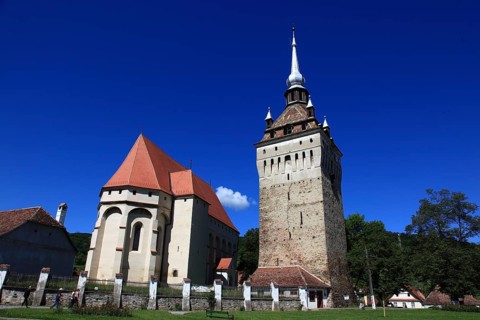 Romania, the church tower and church of Saschiz, German Keisd, a community in Mures County,