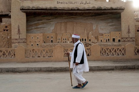 Siwa, Egypt. March 11th 2018 A local Siwian man wearing traditional clothes walking in the streets