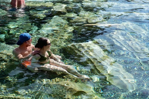 Pamakkale, Turkey, April 25th 2020 Tourists enjoy the healing properties of thermal waters among
