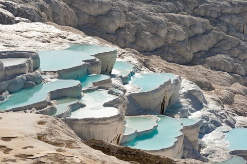 Pamukkale Travertine Terraces, amazing aqua blue pools of thermal mineral rich spring water set