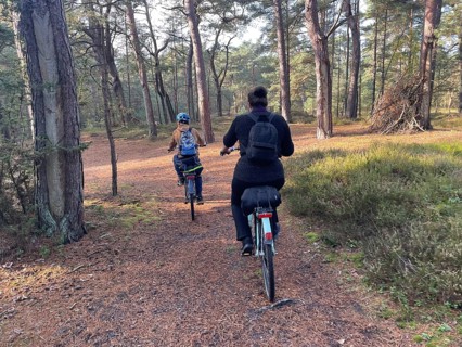 Family trip by bike, mother with child, Vorpommersche Boddenlandschaft National Park,